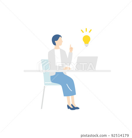 A business woman who inspires while working on a computer 92514179