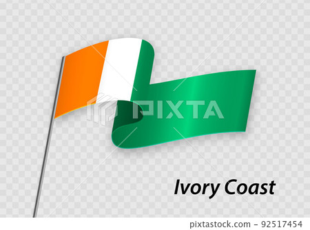 Waving flag of Ivory Coast on flagpole. Template for independence day 92517454