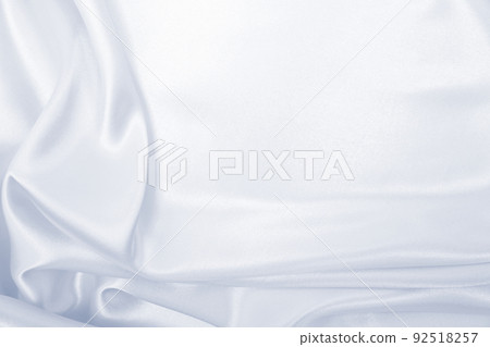 Smooth elegant grey silk or satin luxury cloth as wedding background. Luxurious background design Smooth elegant grey silk or satin luxury cloth as wedding background. Luxurious background design 92518257