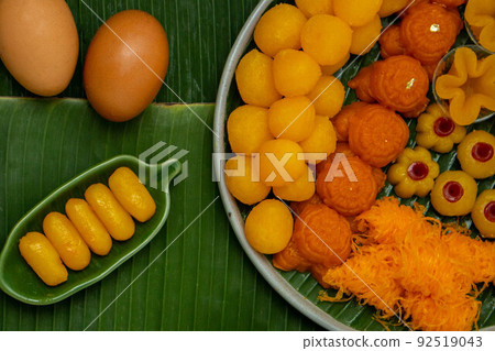 Thai traditional dessert concept, Various thai desserts made from egg yolks and sugar in plate 92519043