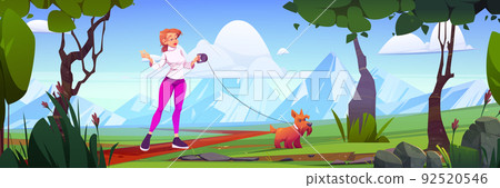 Woman walk with dog in natural park with mountains 92520546