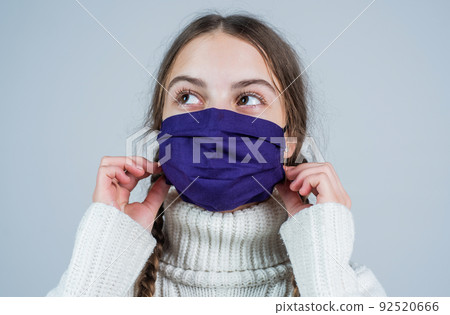 teen girl wear respirator mask while coronavirus pandemic quarantine, lockdown teen girl wear respirator mask while coronavirus pandemic quarantine, lockdown 92520666