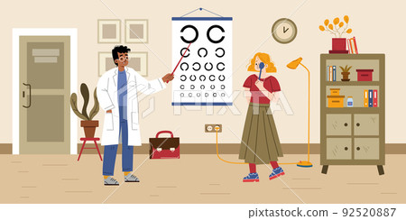 Doctor ophthalmologist check patient vision 92520887