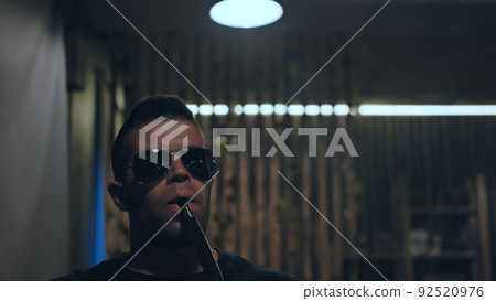 Arabic jordanian young man smokes a hookah. 92520976