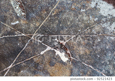 Texture detail macro of burned and scratched hard drive disk 92521423