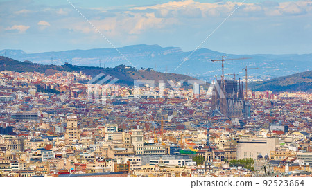 View above on Barcelona from Montjuic hill. Sagrada Familia cathedral. 92523864