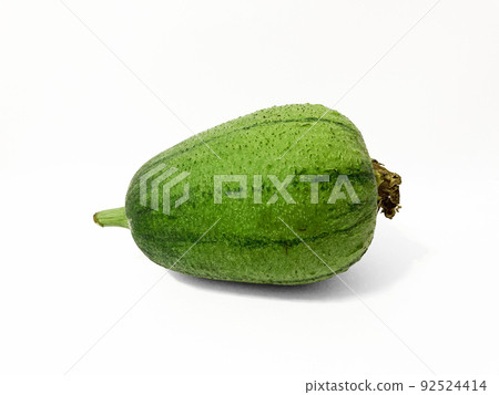 fresh green luffa lay on white background 92524414