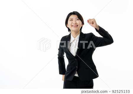白色背景上穿著西裝的年輕女商人 92525133