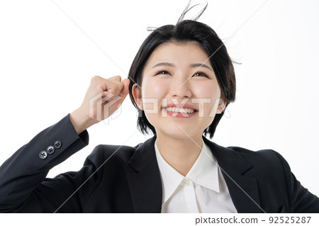 Young business woman in recruitment suit on white background 92525287