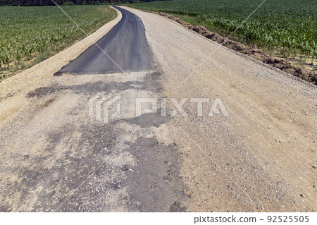 paved road for car traffic 92525505