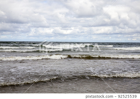 Cold summer season on the Baltic Sea in windy weather Cold summer season on the Baltic Sea in windy weather 92525539