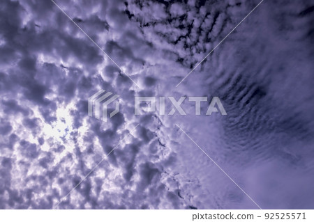 Blue sky with light clouds in windy weather Blue sky with light clouds in windy weather 92525571