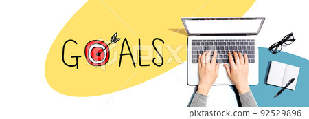 Goal concept with person using a laptop Goal concept with person using a laptop 92529896