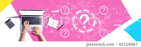 Question marks with person using a laptop Question marks with person using a laptop 92529967