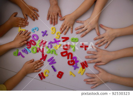 asian kids learning english, top view. Education concept asian kids learning english, top view. Education concept 92530323