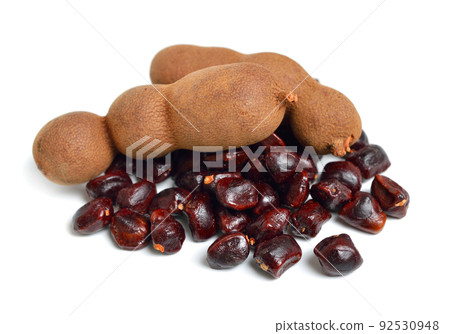Ripe tamarind fruit isolated on white background 92530948