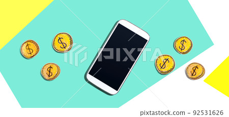 Blank smartphone with coins - earn online theme Blank smartphone with coins - earn online theme 92531626