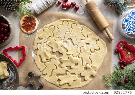 Cooking Christmas cookies. Ginger bread cookie cutter. Step by step recipe. 92531776