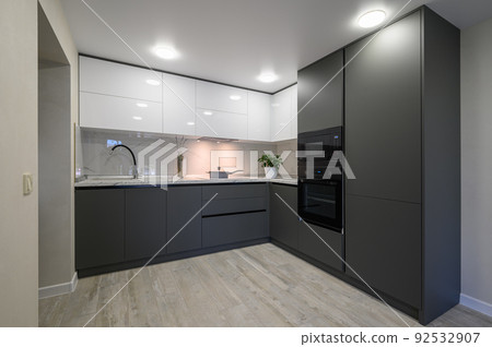Modern simple trendy dark grey and white kitchen 92532907