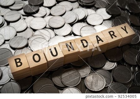 Boundary / Boundary line image | Blocks and coins with "BOUNDARY" written on them 92534005