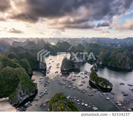 Floating fishing village and rock island in " Lan Ha " Bay, Vietnam, Southeast Asia Floating fishing village and rock island in " Lan Ha " Bay, Vietnam, Southeast Asia 92534237