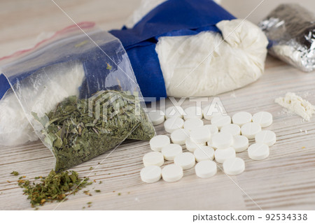 a suspected drug trafficking - cocaine, heroin, spice, marijuana, and etc - many 92534338