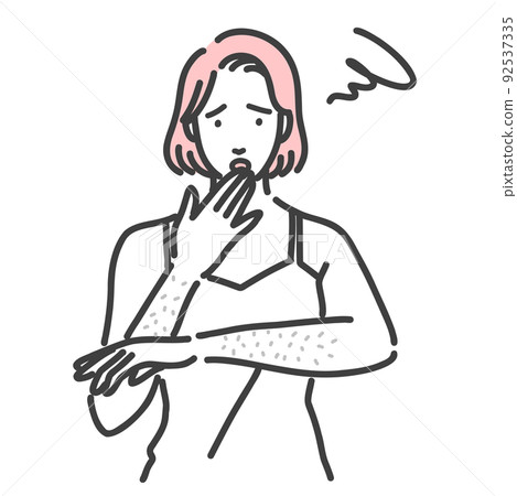 A young woman suffering from wasted hair on her arm 92537335
