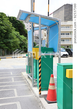 Gate-type coin parking in the city Gate-type coin parking in the city 92537380