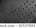 Metal non-slip texture on dark concrete background 92537893