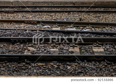 Railroad crossing through in railway station. 92538866