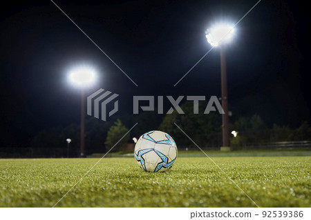Soccer ball and soccer ground Soccer ball and soccer ground 92539386