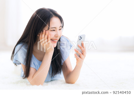 Female Smartphone Living Lifestyle Female Smartphone Living Lifestyle 92540450