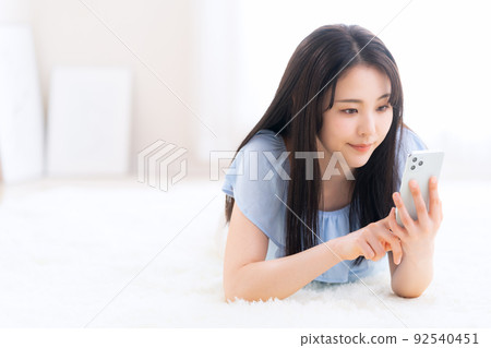 Female Smartphone Living Lifestyle Female Smartphone Living Lifestyle 92540451