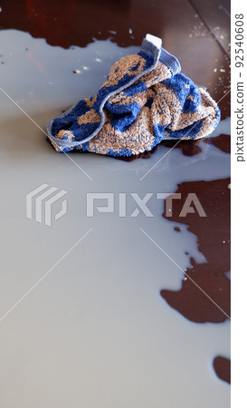 Spilled iced coffee 92540608