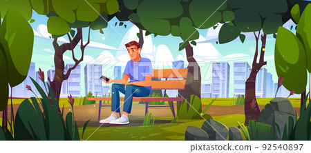 Man use mobile phone sitting on bench in city park 92540897
