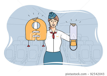 Smiling stewardess showing safety on plane Smiling stewardess showing safety on plane 92542043