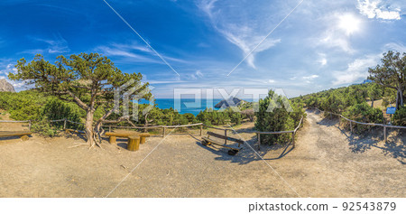 Beautiful seascape, panorama of cape Kapchik to the Galitsin Trail and blue bay of the Black Sea. Sudak, New World. Landscape of the sea coast. The concept of calmness, silence and unity with nature. Beautiful seascape, panorama of cape Kapchik to the Galitsin Trail and blue bay of the Black Sea. Sudak, New World. Landscape of the sea coast. The concept of calmness, silence and unity with nature. 92543879