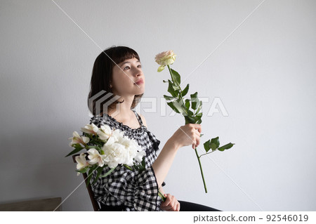 一個喜歡鮮花的女人 92546019
