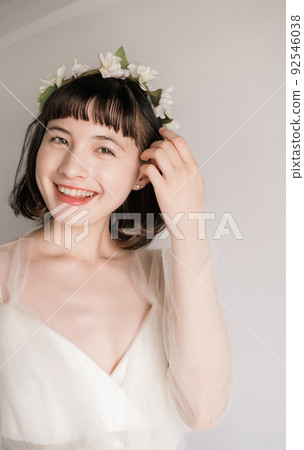 A woman in her dress 92546038