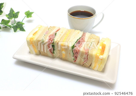 Mixed sandwich (mini sandwich) and coffee 92546476