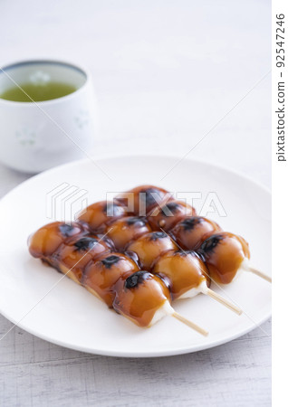 Mitarashi dumplings and green tea Mitarashi dumplings and green tea 92547246