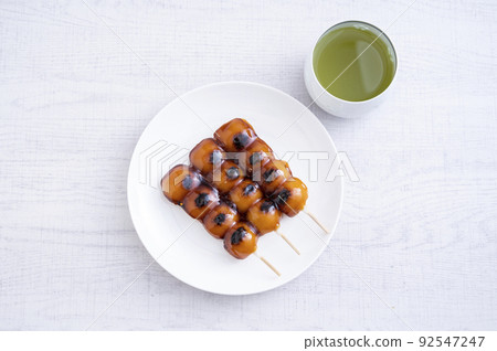 Mitarashi dumplings and green tea Mitarashi dumplings and green tea 92547247