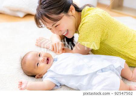 Baby and mother 92547502