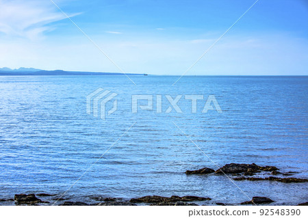 Kunisaki Peninsula and Beppu Bay seen from Saganoseki Peninsula 92548390