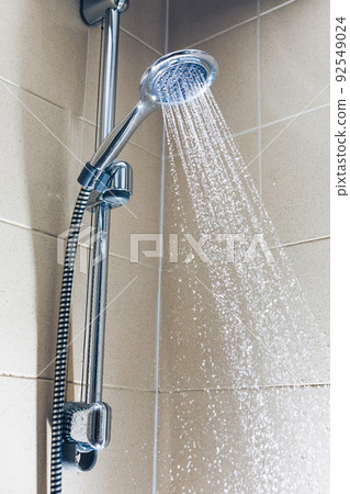 shower with water stream, close-up view shower with water stream, close-up view 92549024