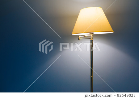 lamp light on blue background with copy-space lamp light on blue background with copy-space 92549025