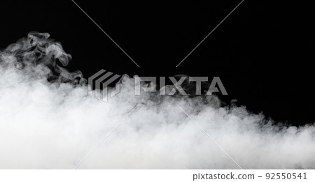 thick stream of fog isolated on black 92550541