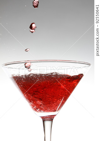 red cocktail on white 92550641