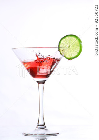 red cocktail with lime on white red cocktail with lime on white 92550723