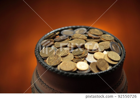 pot of golden coins 92550726